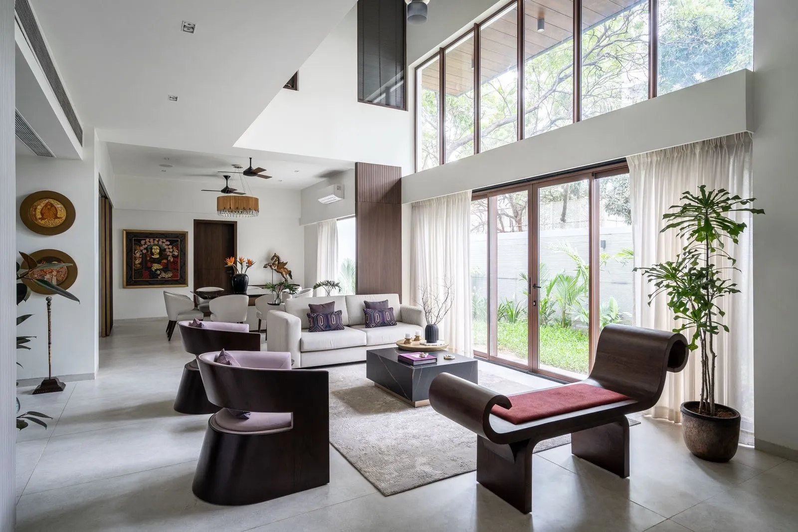 Double-height luxury living room interior design in South Delhi by Evas Designs — interior designer near Vasant Kunj