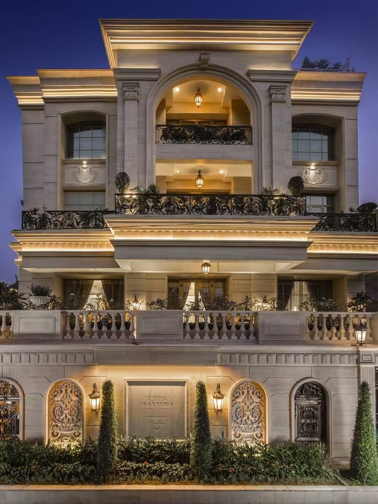 Luxury builder floor facade in South Delhi with classical elevation and evening lighting